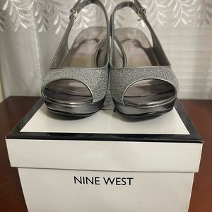 Nine west textile /synthetic upper man made woman heels. Size 61/2